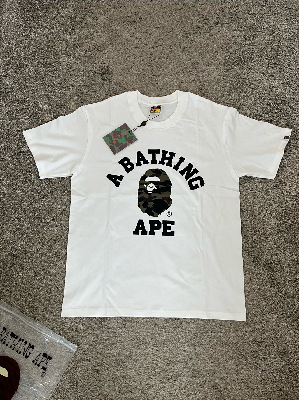 Bape White Tee With Black Graphic And Green Camo Tag